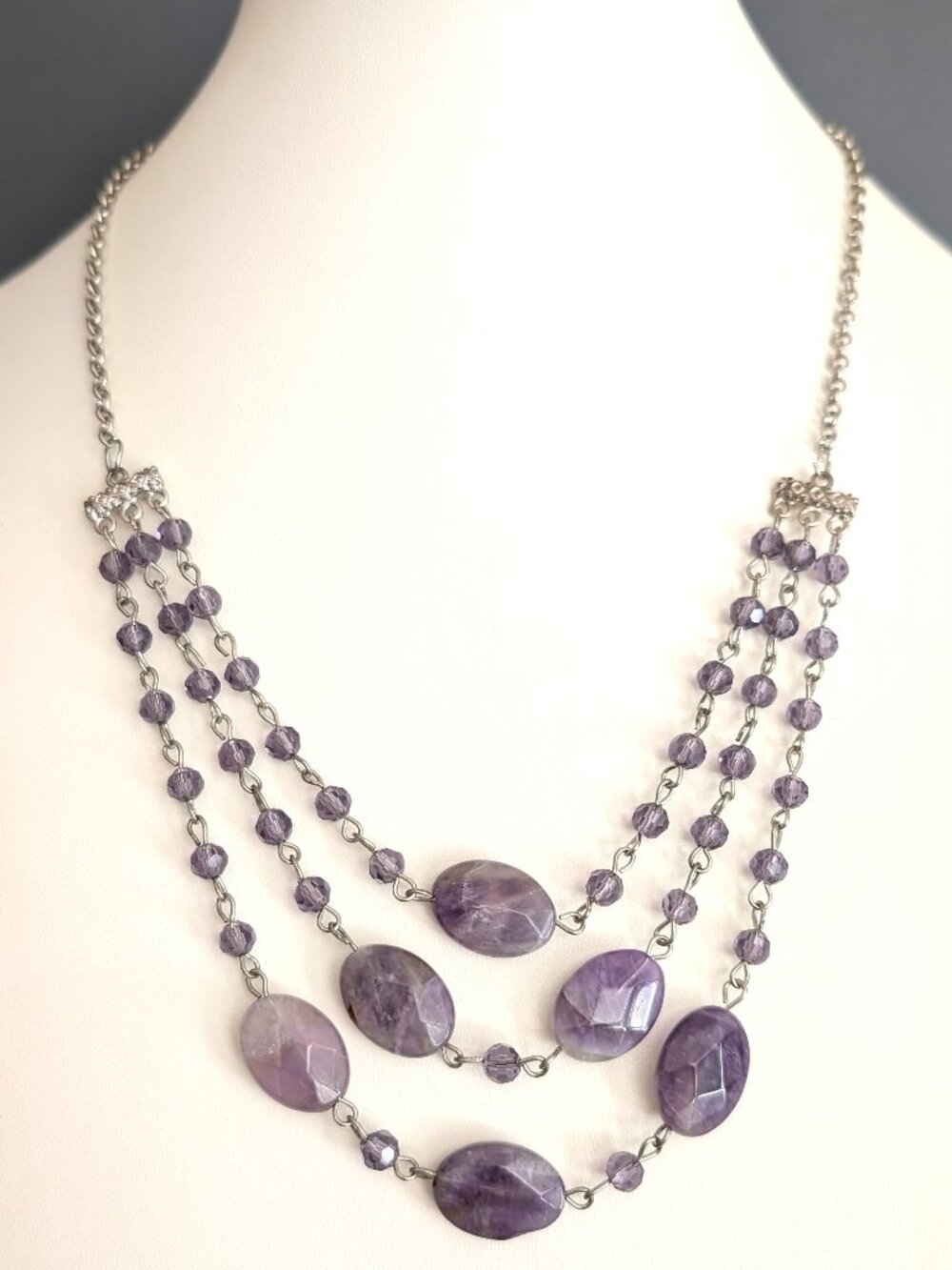 Amethyst stone necklace with purple crystal accents